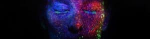 colorful lights on face, how psychedelics help people heal trauma and overcome ptsd